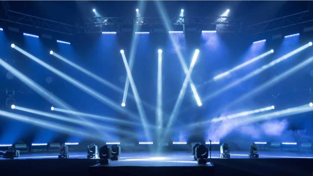 Professional DJ beam moving head lights creating aerial effects on stage Professional DJ beam moving head lights creating aerial effects on stage